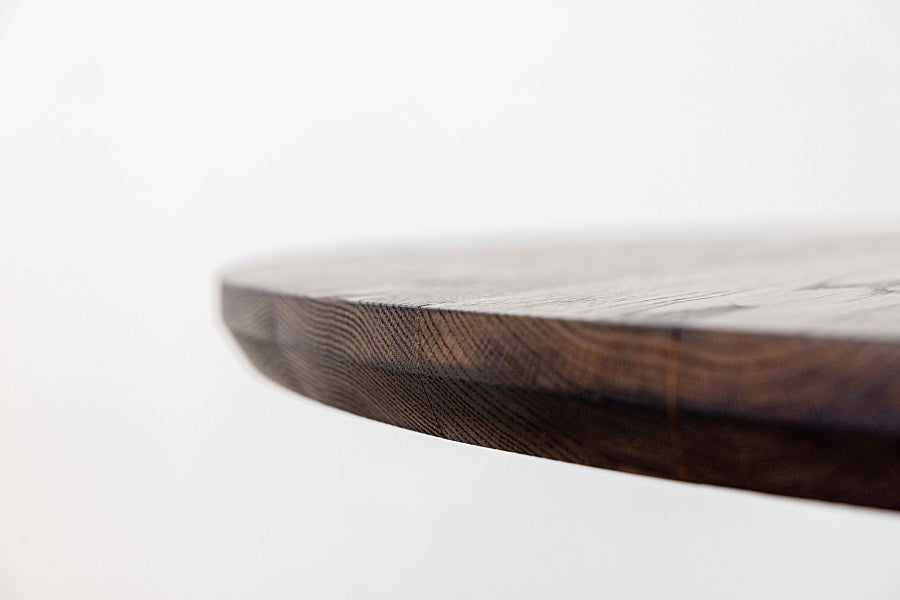 Close-up of Round Wood Dining Tabletop Edge