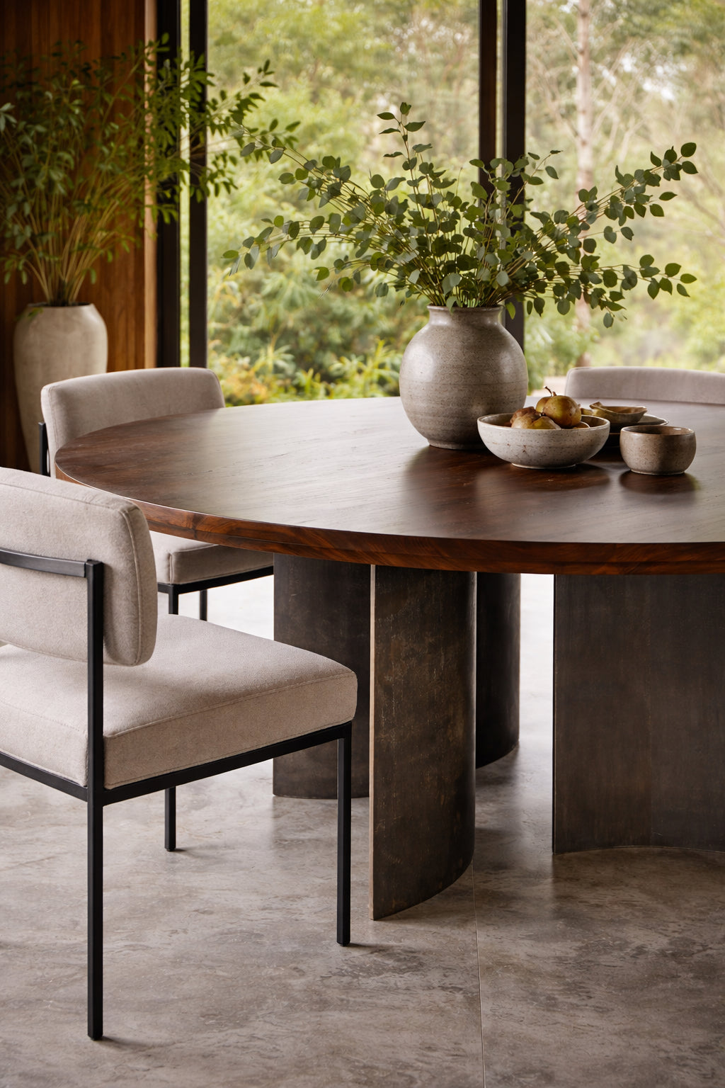 Ban Round Walnut Dining Table — Sculptural Steel Base