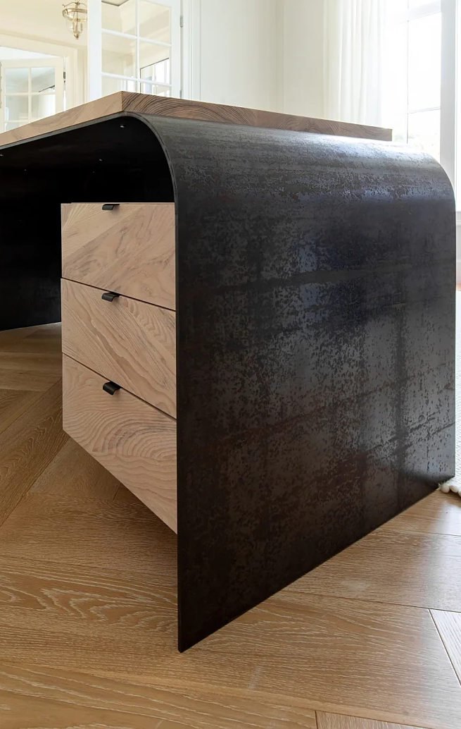 Handcrafted contemporary desk—solid wood top with sculptural steel base, by Autonomous Furniture Victoria