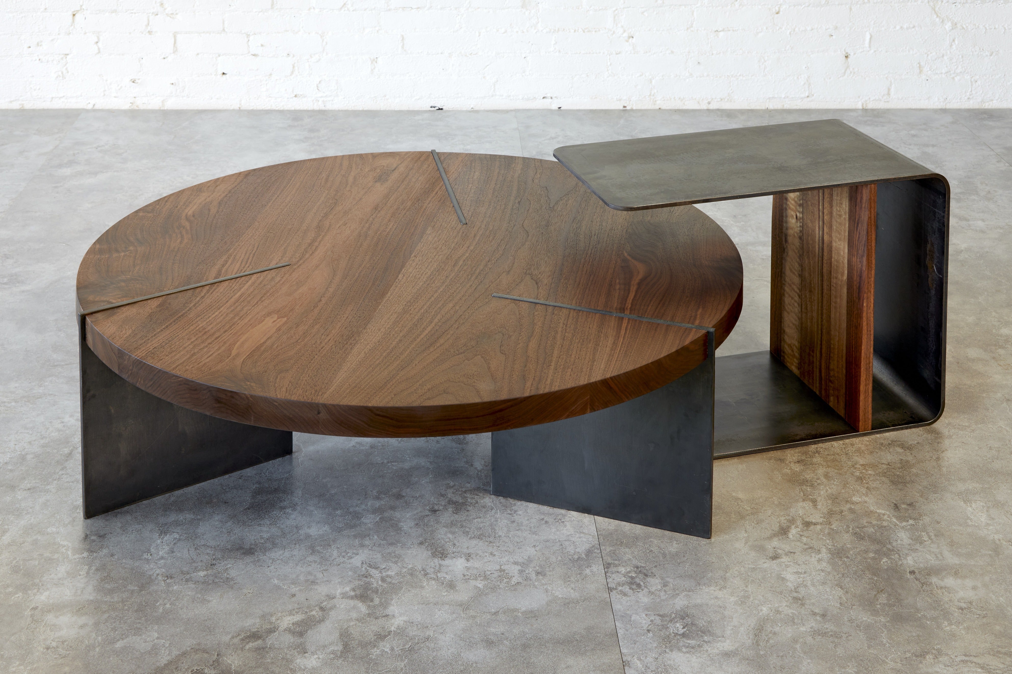 Walnut nesting coffee table set with blackened steel side table in modern living room