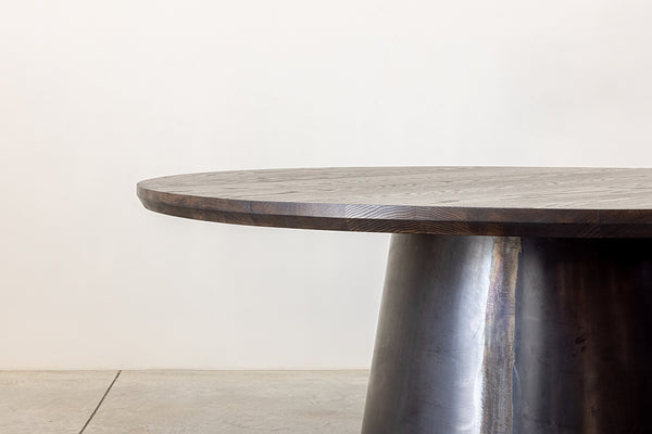 Close-up of Round Wood Dining Table