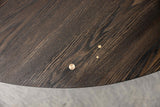 Close-up of Round Wood Tabletop of Dining Table