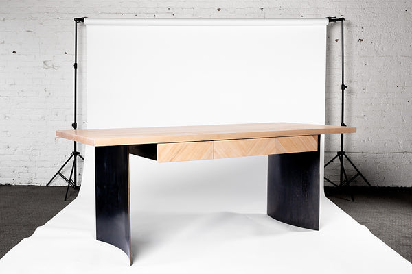 Ban wood and curved steel desk